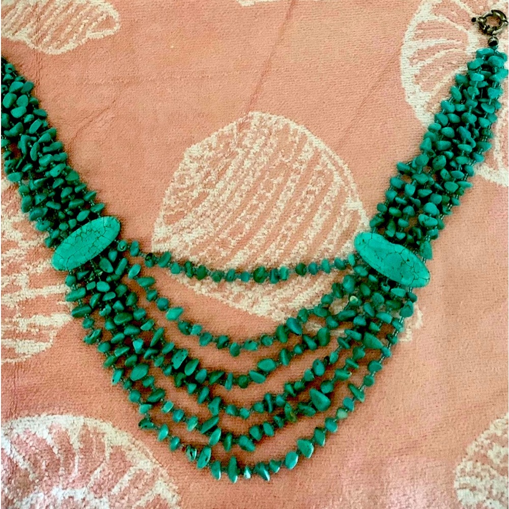 Beautiful 5 strand simulated turquoise necklace.